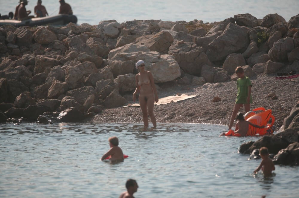 FKK cove pyramid in waters - Since ancient times, nudity has had a sacred character