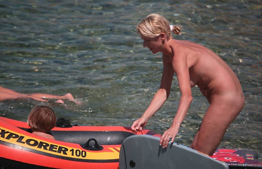 Red Boating for Two Nudists pics - Naturalness and freedom are the core principles of naturism and nudism