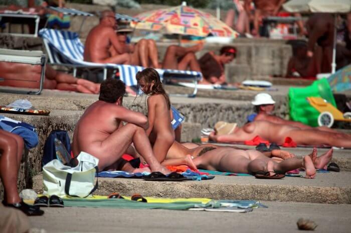 Passing Through Shores photo - Nudists relax beautifully—a sight to behold