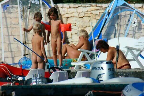 By the boat photos - The nudist community strives for tolerance