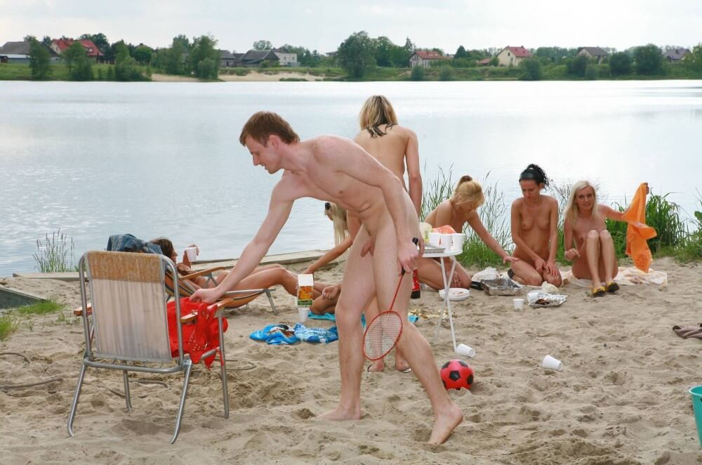 Lakeside Outdoor Activity photos - Nudists relax beautifully—a sight to behold